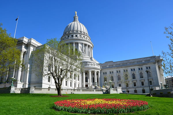 Capitol building OurGov Wisconsin Lobbying Legislative Bill Tracker. Better than The Wheeler Report, Bill Comparison, Comments, Task Management, Advocacy Tools. Lobbying Software.